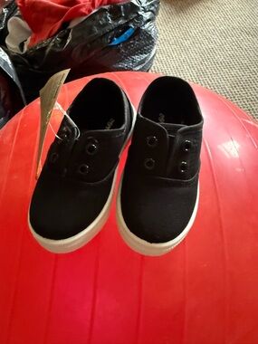 oomphies Black Canvas Slip-On Sneakers with White Sole